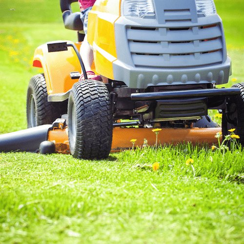 Lawn mowing on a seated lawn mower in Frankston Victoria